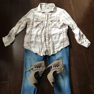 Brown button down collared shirt